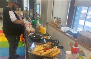 parent serving holiday breakfast